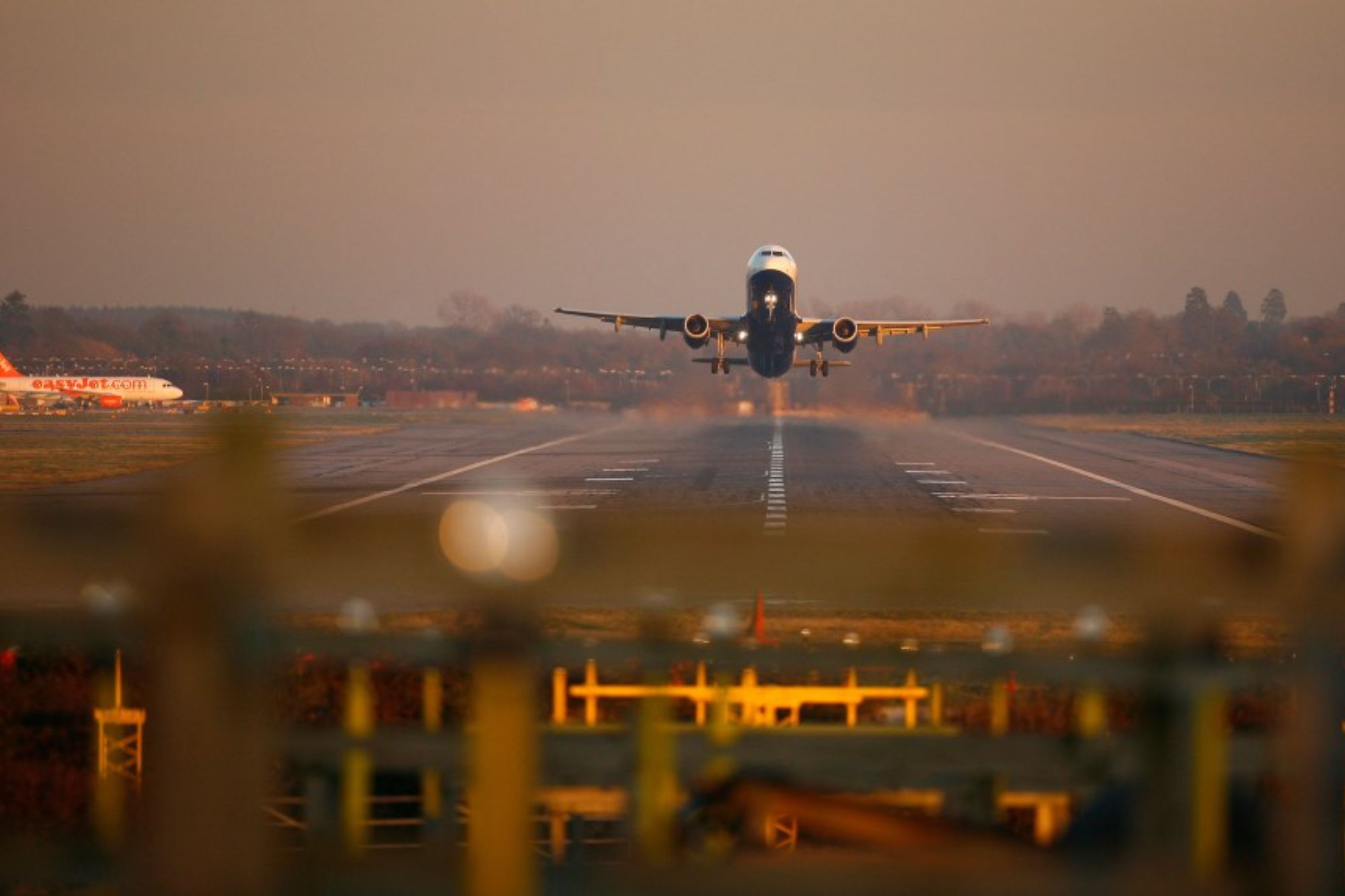An image collage containing 1 images, Image 1 shows A passenger jet taking off from London Gatwick airport