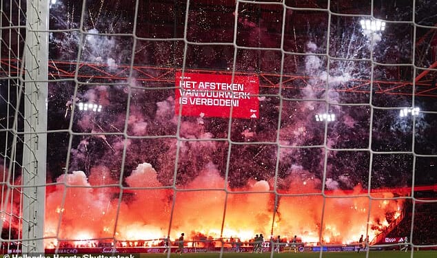 A huge explosion of fireworks behind one of the goals meant that play could not continue