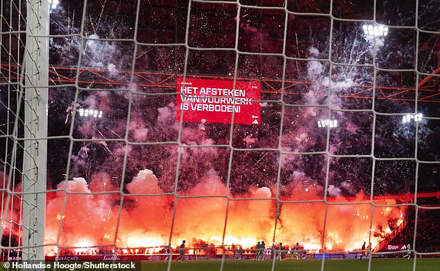 A huge explosion of fireworks behind one of the goals meant that play could not continue