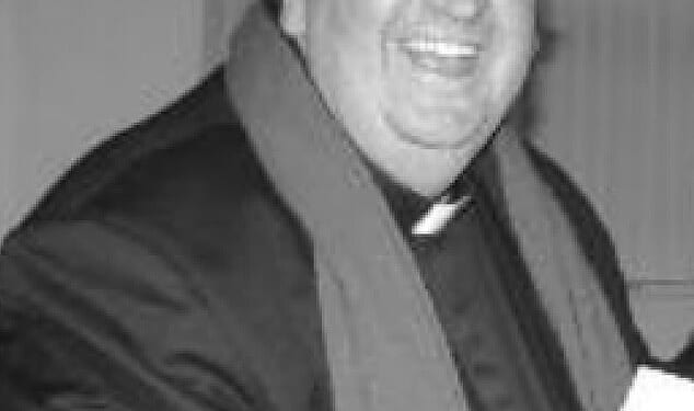 Father Mark Rowles, 57, posted under the name 'skinheadlad1488' in a racist chatroom called Aryan Reich Killers, where he wrote racist and offensive messages