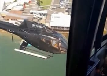Horrifying footage shows the moment two helicopters crashed into each other over the coast of Australia, killing a British couple and two others