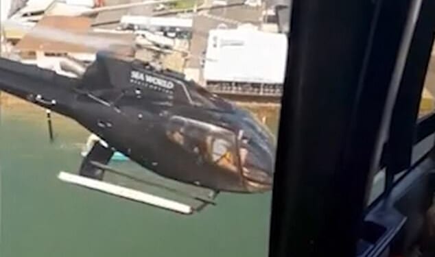 Horrifying footage shows the moment two helicopters crashed into each other over the coast of Australia, killing a British couple and two others