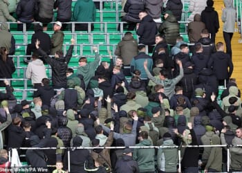 Celtic supporters boo during minute's silence on Remembrance Day as referee ends tribute after just 10 SECONDS