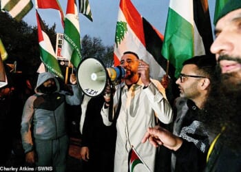 By the time Maccabi Tel Aviv arrived, two noisy protests were getting underway on separate sides of this grand football stadium