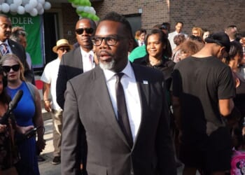 Chicago Mayor Brandon Johnson greets students, parents, and staff during the first day of classes at Beidler Elementary School on Aug. 21, 2023, in Chicago, Illinois.