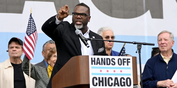 Brandon Johnson, Mayor of Chicago, speaks onstage as people protest as part of the No Kings Rallies on October 18, 2025 in Chicago, Illinois.