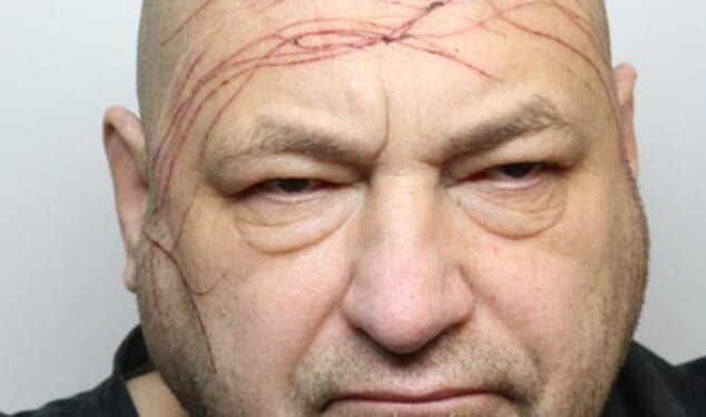 The image, published by Thames Valley Police shows the scowling bully with what seems to be blood red scratches across his forehead and right cheek