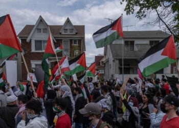 Hundreds of residents of Dearborn, Michigan, march through the neighborhoods in Dearborn on May 15, 2021, to protest the actions of the Israeli Army in Gaza as well as the forced removal of Palestinian families in Sheikh Jarrah in East Jerusalem.