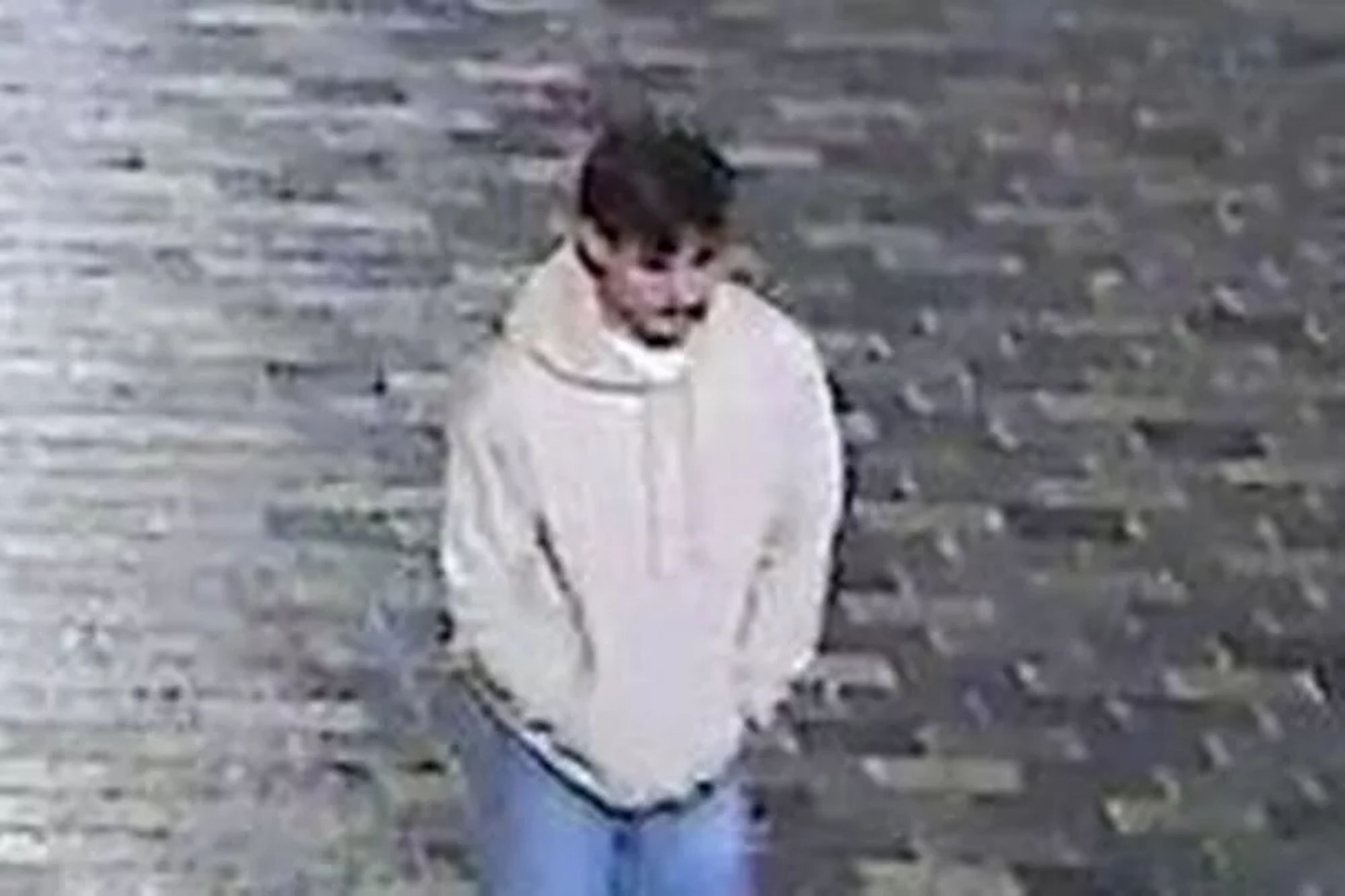 An image collage containing 1 images, Image 1 shows Surveillance footage of a man in a light-colored hoodie and blue jeans, seen from above