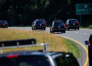 President Donald Trump rides in a motorcade to his private golf club on the morning of July 4, 2025, in Sterling, Virginia.