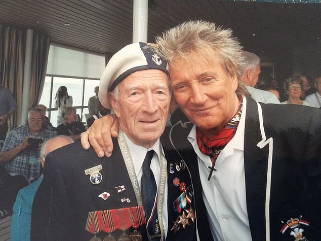 Alec (pictured with Rod Stewart) holds a proud record as the country¿s oldest poppy seller
