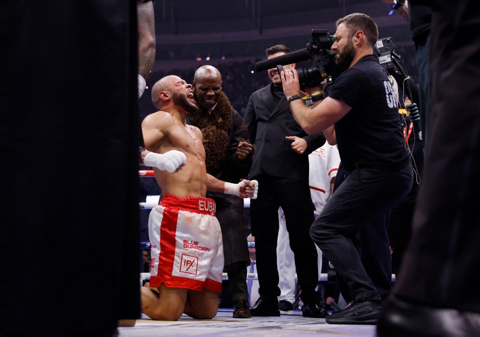 Chris Eubank Jr. celebrates after a boxing match.