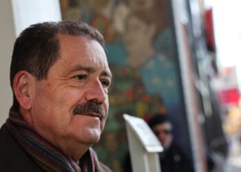 Rep. Jesus "Chuy" Garcia greets commuters during an early morning campaign stop in the Pilsen neighborhood on Feb. 21, 2023, in Chicago, Illinois.