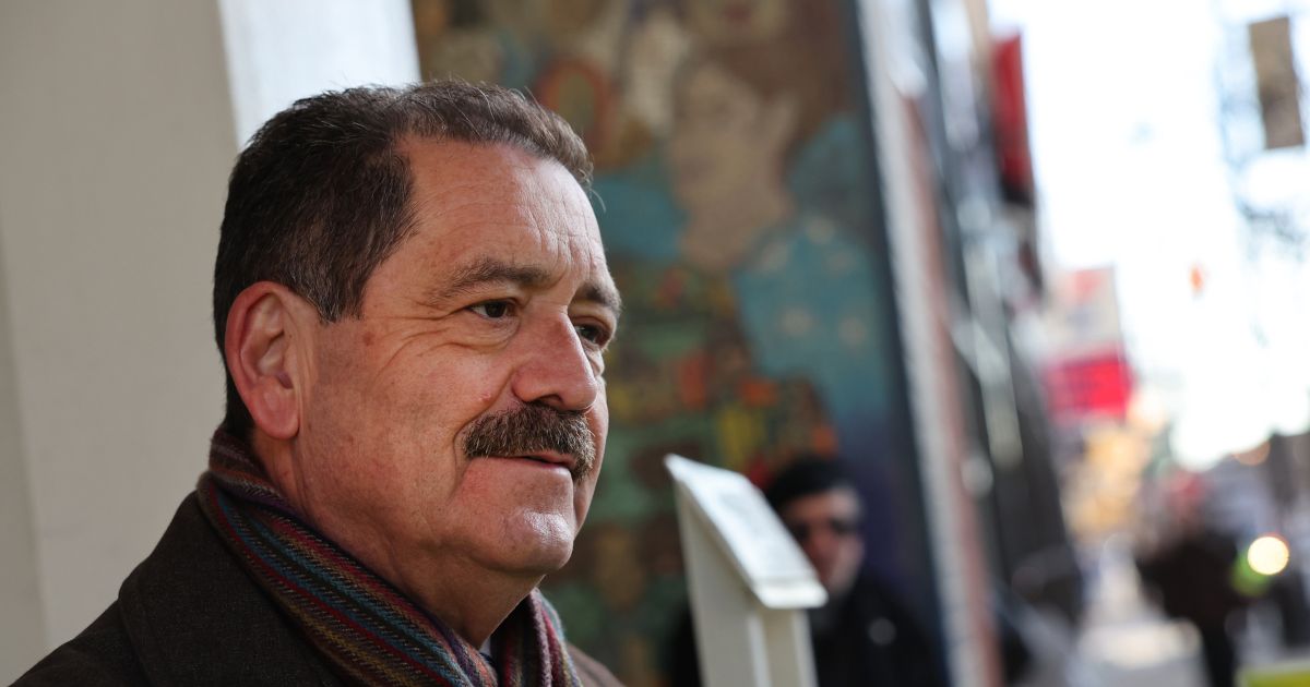 Rep. Jesus "Chuy" Garcia greets commuters during an early morning campaign stop in the Pilsen neighborhood on Feb. 21, 2023, in Chicago, Illinois.