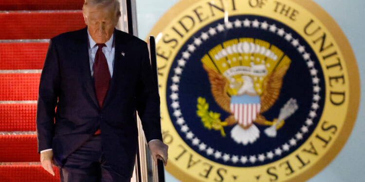 President Donald Trump walks down the stairs of Air Force One upon his arrival at Joint Base Andrews, Maryland, on Nov. 5, 2025, after giving a speech at the American Business Forum in Miami.