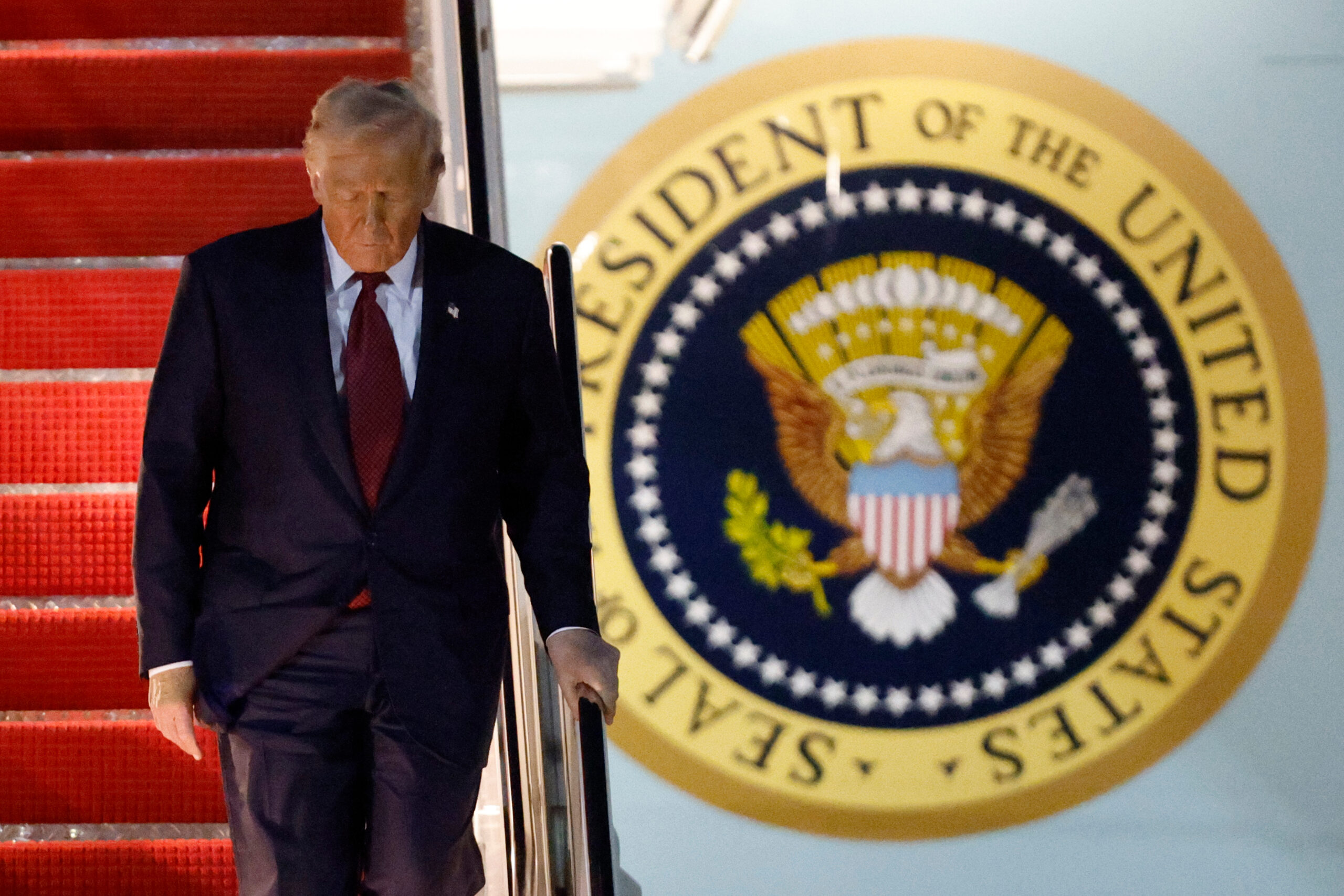 President Donald Trump walks down the stairs of Air Force One upon his arrival at Joint Base Andrews, Maryland, on Nov. 5, 2025, after giving a speech at the American Business Forum in Miami.