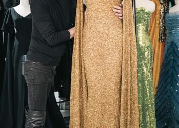 Marc Bouwer, seen with one of his recent designs, made hundreds of ensembles for Whitney Houston and has lifted a lid on what it was really like working with the late singer