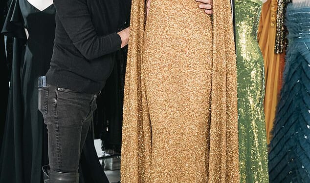 Marc Bouwer, seen with one of his recent designs, made hundreds of ensembles for Whitney Houston and has lifted a lid on what it was really like working with the late singer