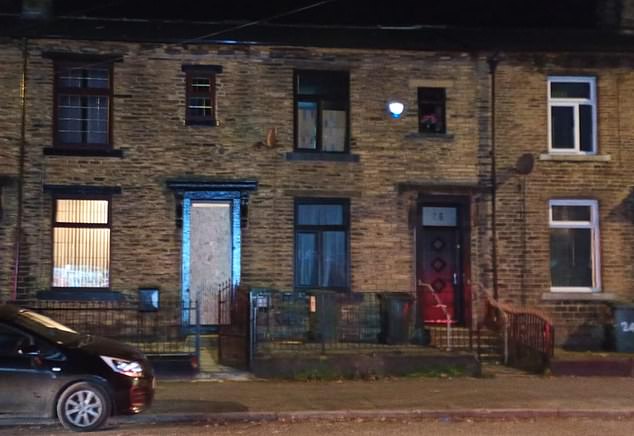 Detectives in Bradford have raided three properties in the city including these two, which are neighbouring houses. Police said that they had launched a money laundering investigation after finding large amounts of cash at the properties