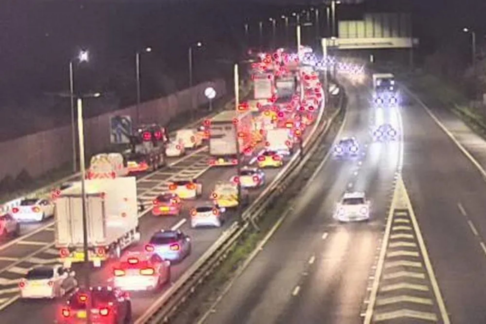 An image collage containing 1 images, Image 1 shows Traffic on a motorway at night