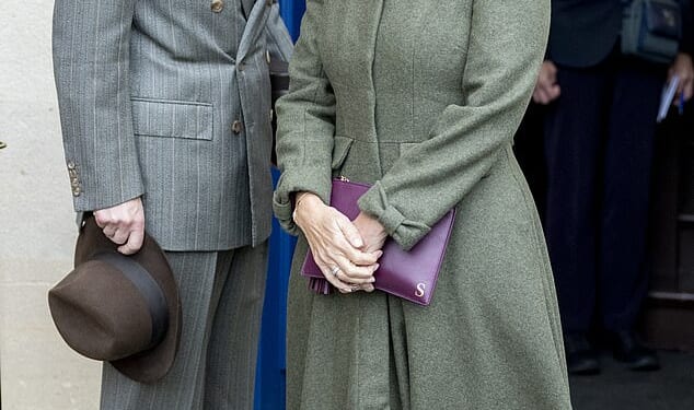Sophie, Duchess of Edinburgh and Prince Edward, Duke of Edinburgh, pose for photographs after reopening the Royal Box at Newbury Racecourse