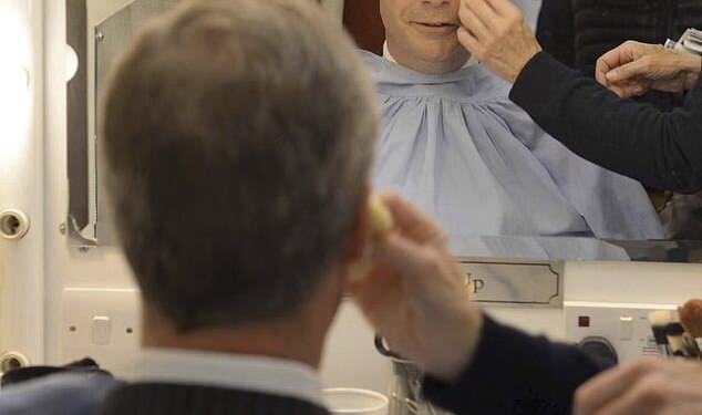 Historian and best-selling author Lisa Hilton, who has presented BBC TV documentaries, has made the extraordinary claim that Farage's face was painted with deliberately contaminated brushes when appearing on its programmes. Pictured: Farage sits wearing make-up before appearing in the 'BBC Vote 2013' studio at Milbank in London