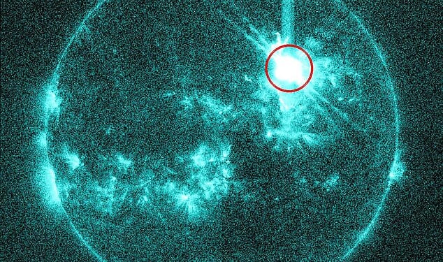 A powerful X5.1-class flare, capable of disrupting satellites, high-frequency radio and high-altitude flights, burst from the sun today
