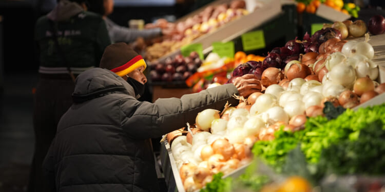 Customers shop at the Reading Terminal Market in Philadelphia on Oct. 29, 2025.