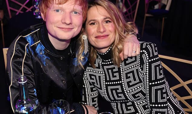Ed Sheeran and his wife Cherry Seaborn at the 2022 Brit Awards. The couple have upset local residents in Suffolk after they submitted plans to convert two historic seaside cottages into a mega coastal home