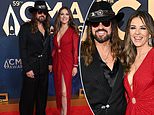 Elizabeth Hurley and Billy Ray Cyrus gaze lovingly at each other as they ooze romantic bliss at CMA Awards