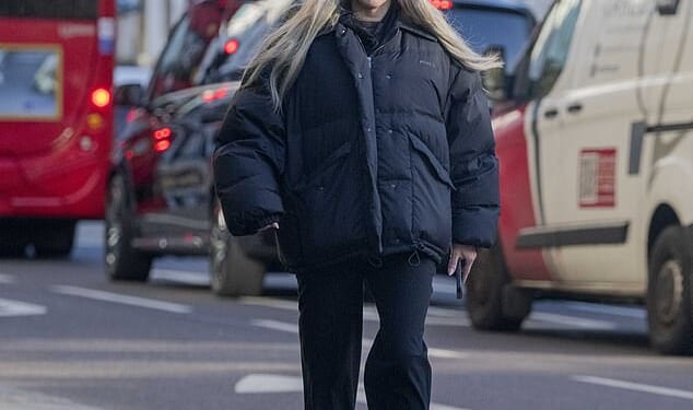 Ellie Goulding, 38, was spotted strolling along the streets of west London last week in a padded £2,950 Miu Miu jacket which hid her normally svelte frame