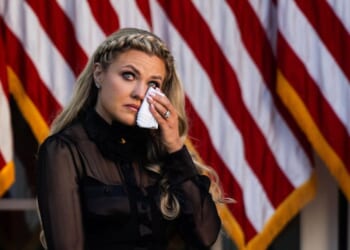 Erika Kirk receives the Presidential Medal of Freedom awarded to late conservative activist Charlie Kirk during a ceremony in the Rose Garden of the White House on Oct. 14, 2025.