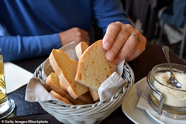 Meier said it's polite to tear bread into smaller pieces before eating, rather than biting directly into it (stock image)