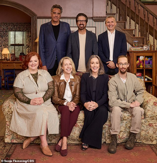 The cast are pictured with series creator Phil Rosenthal on the set of the reunion special