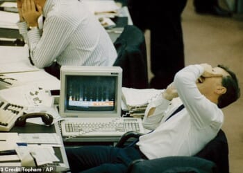 A huge sell-off on the US stock market led to global market turmoil when automated stock trading computer programs created a selling frenzy in October 1987. Pictured: The reaction on the floor of the London Stock Exchange