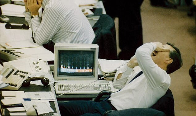 A huge sell-off on the US stock market led to global market turmoil when automated stock trading computer programs created a selling frenzy in October 1987. Pictured: The reaction on the floor of the London Stock Exchange