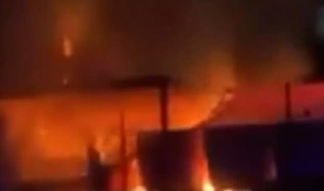 Footage of the inferno shows plumes of black smoke with bright orange and red flames leaping from Exeter City's stadium