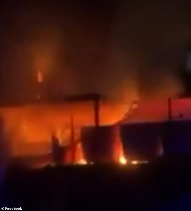 Footage of the inferno shows plumes of black smoke with bright orange and red flames leaping from Exeter City's stadium