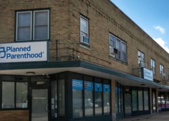 A sign hangs above the front door of a Planned Parenthood clinic on Sept. 25, 2025, in Kenosha, Wisconsin.