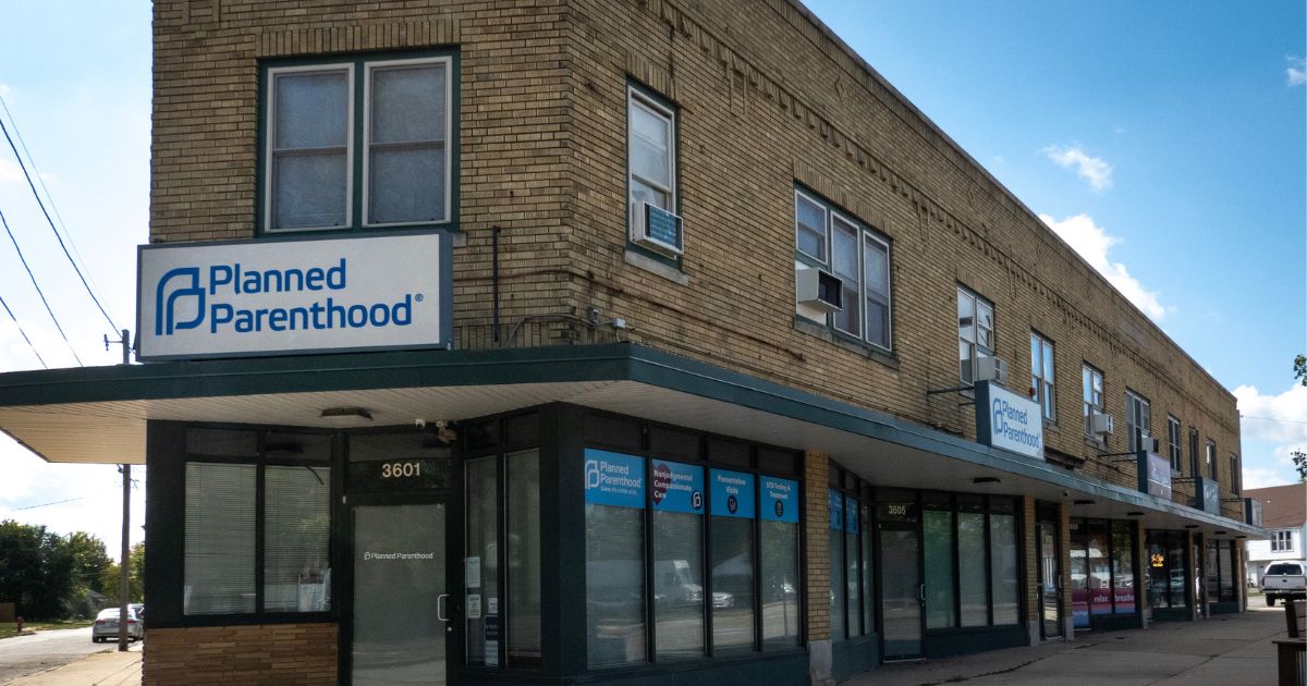 A sign hangs above the front door of a Planned Parenthood clinic on Sept. 25, 2025, in Kenosha, Wisconsin.