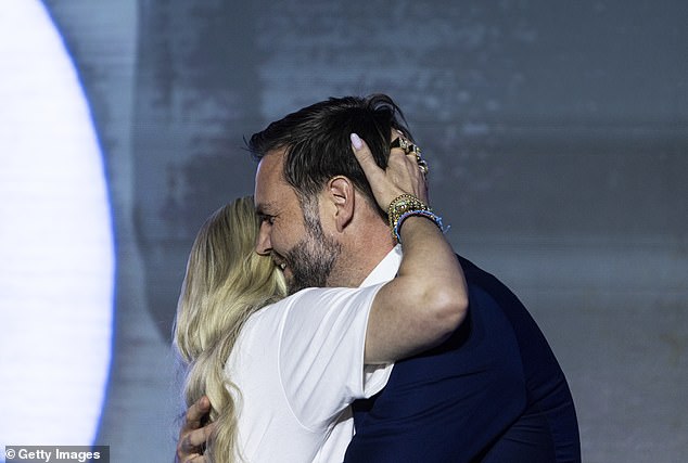 Following an emotional speech, during which Erika evoked her late husband, she greeted the Vice President on-stage with a hug