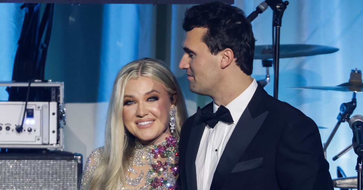 Charlie Kirk, right, is seen with his wife Erika Kirk on stage during the Turning Point USA Inaugural-Eve Ball in Washington, D.C., on Jan. 19.