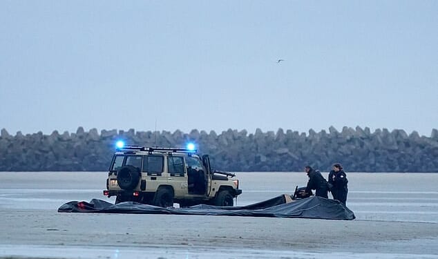 French police are preparing to use 30-metre nets to snare migrant boats in the Channel - despite warning the tactic is so dangerous it could leave people dead. Pictured: French police vessel passes lifejackets to migrants on a dinghy as they cross the English Channel on August 25, 2025