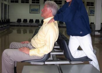 Bill Clinton receives a massage from Jeffrey Epstein victim Chauntae Davies in 2002. The former president has previously denied knowing anything about the financier's crimes