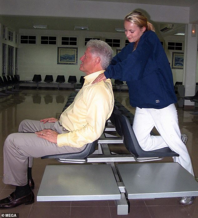 Bill Clinton receives a massage from Jeffrey Epstein victim Chauntae Davies in 2002. The former president has previously denied knowing anything about the financier's crimes