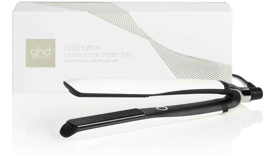 ghd Platinum+ professional smart styler hair straightener with its box.