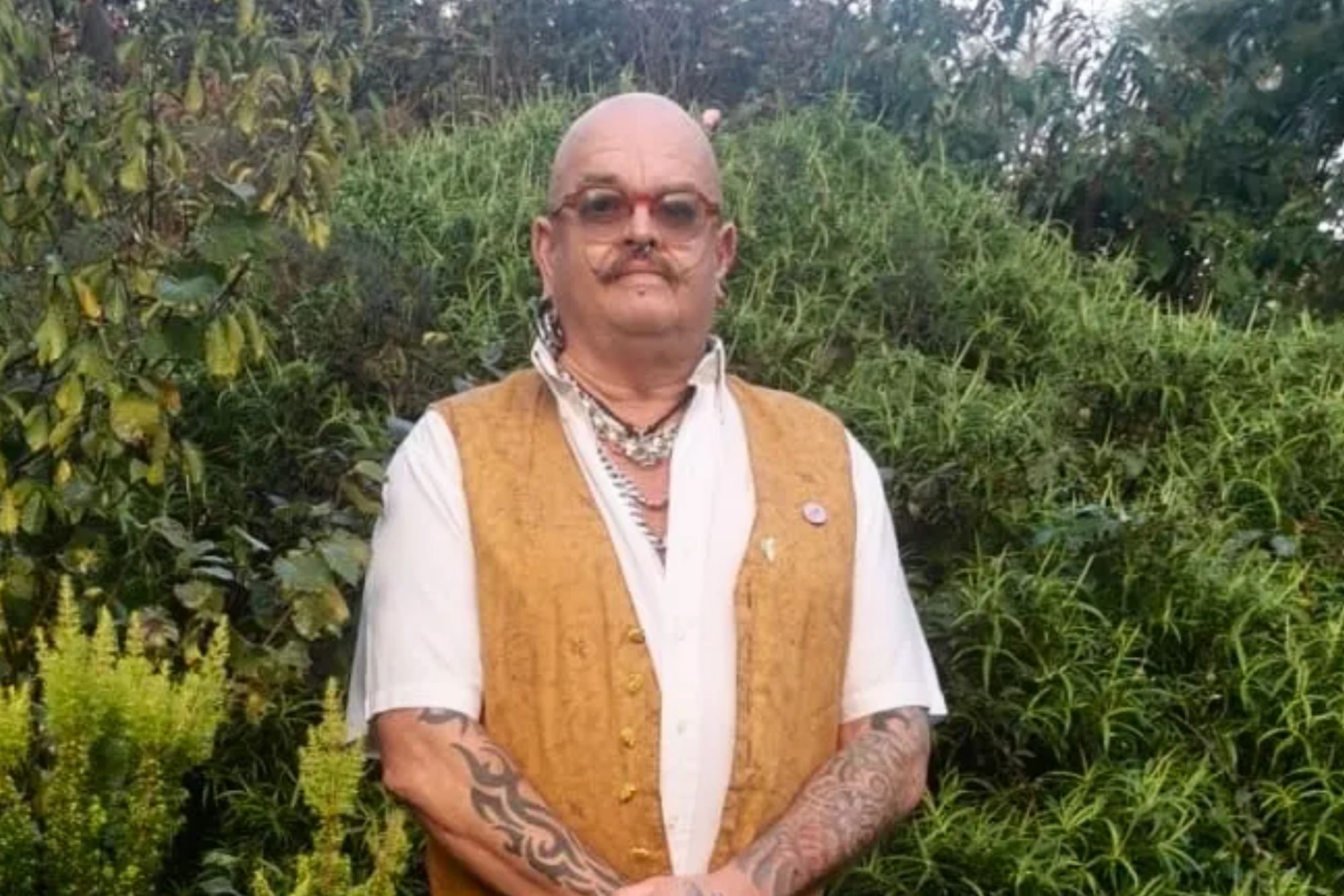 An image collage containing 1 images, Image 1 shows Jim Gardner standing in his award-winning "secret garden."