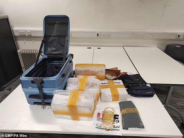 Money and gold worth up to £2million were seized at Manchester Airport in a 'record' haul