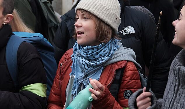 Greta Thunberg has been banned from Venice after dumping green dye in the Grand Canal in a stunt alongside Extinction Rebellion activists