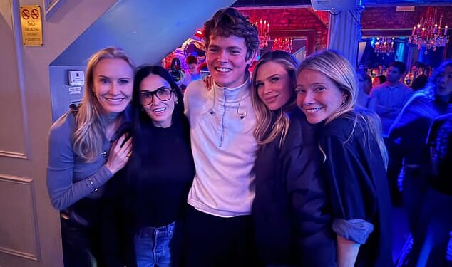 Gwyneth Paltrow's son Moses Martin towered over her (R), author Amy Griffin (L), actress Demi Moore (2-L) and producer Sara Foster (2-R) following a recent concert with his newly-renamed band, People I've Met